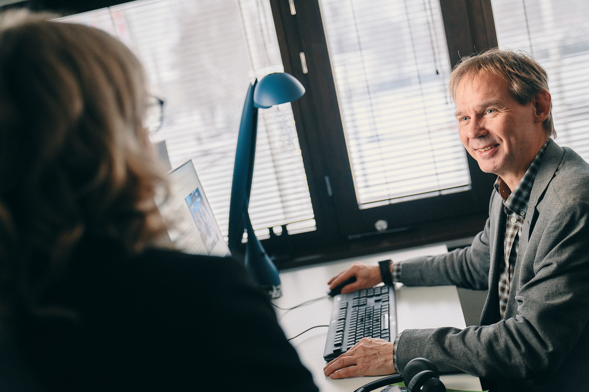 Two people in an office.